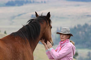 Margrit Coates and Horse with view